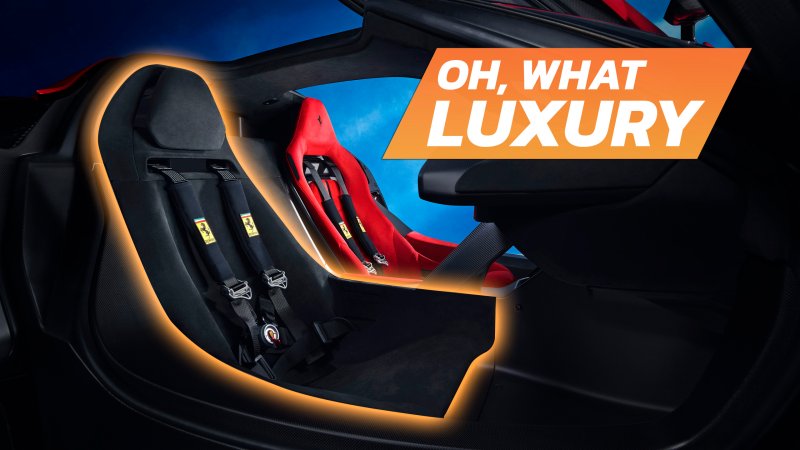Interior shot of the Ferrari F80 from the passenger's side, highlighting the discrepancy in seating between the driver and passenger, with the text "Oh, What Luxury" superimposed.