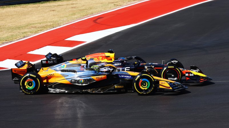 AUSTIN, TEXAS - OCTOBER 20: Max Verstappen of the Netherlands driving the (1) Oracle Red Bull Racing RB20 and Lando Norris of Great Britain driving the (4) McLaren MCL38 Mercedes battle for track position round turn one at the start during the F1 Grand Prix of United States at Circuit of The Americas on October 20, 2024 in Austin, Texas. (Photo by Mark Thompson/Getty Images)