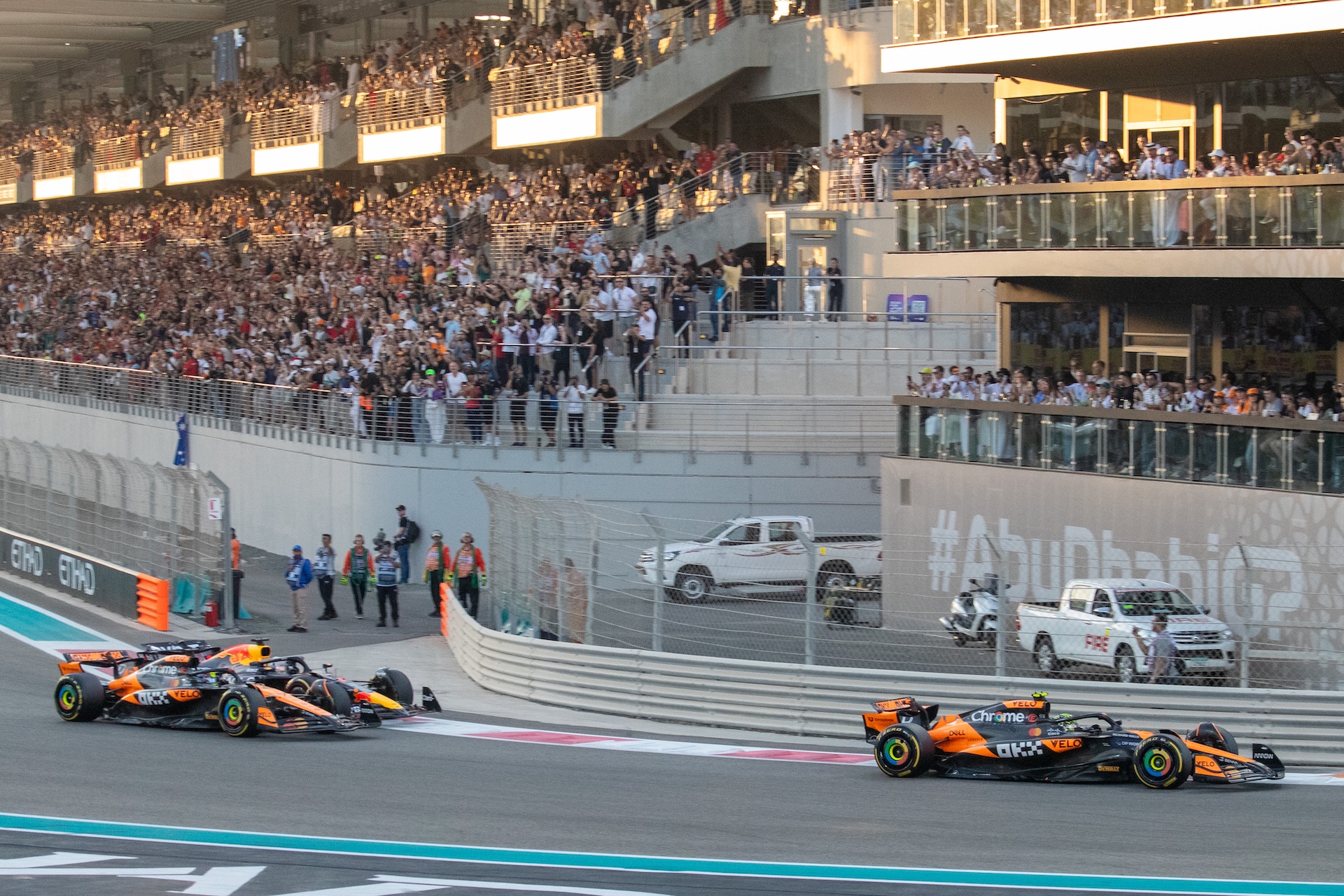 Oscar Piastri of Australia, driving the (81) McLaren F1 Team MCL38 Mercedes, and Max Verstappen of the Netherlands, driving the (1) Oracle Red Bull Racing RB20 Honda RBPT, crash during the Formula 1 Etihad Airways Abu Dhabi Grand Prix 2024 in Abu Dhabi, United Arab Emirates, on December 8, 2024. (Photo by Alessio Morgese/NurPhoto via Getty Images)
