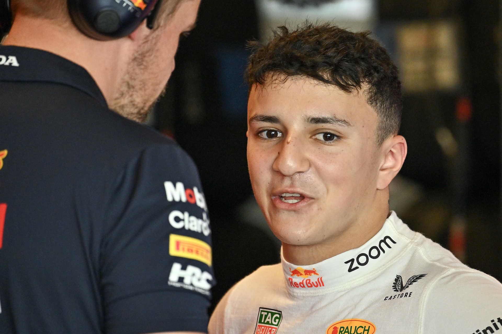 ABU DHABI, UNITED ARAB EMIRATES - DECEMBER 10: Isack Hadjar of France and Oracle Red Bull Racing in the garage during Formula 1 testing at Yas Marina Circuit on December 10, 2024 in Abu Dhabi, United Arab Emirates. (Photo by Vince Mignott/MB Media/Getty Images)