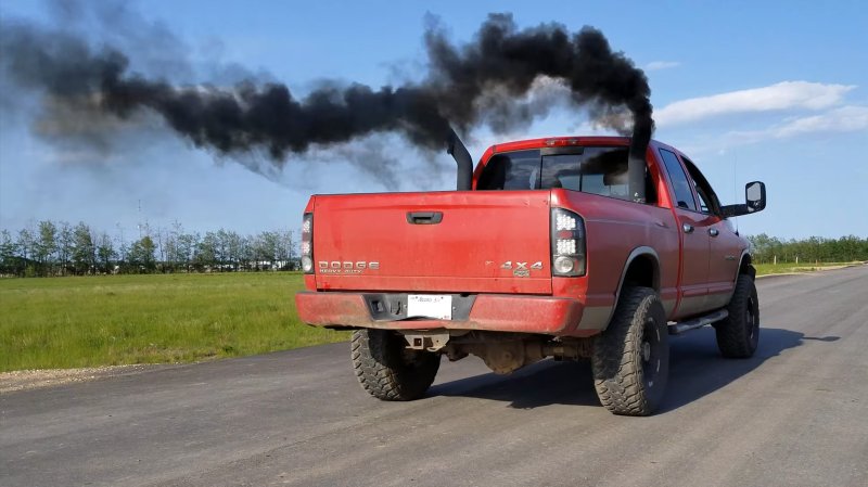 Modified Dodge Ram diesel rolling coal.